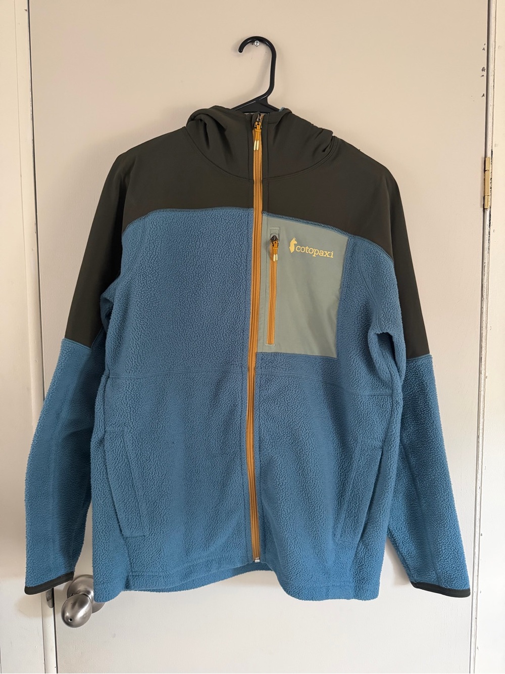 cotopaxi Blue Hooded Puffer-Style Fleece with Olive and Tan Accents